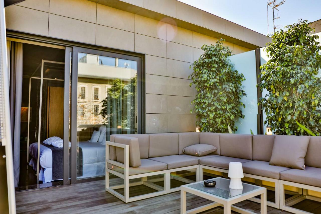Hotel Lobby Sevilla Bagian luar foto The hotel's rooftop