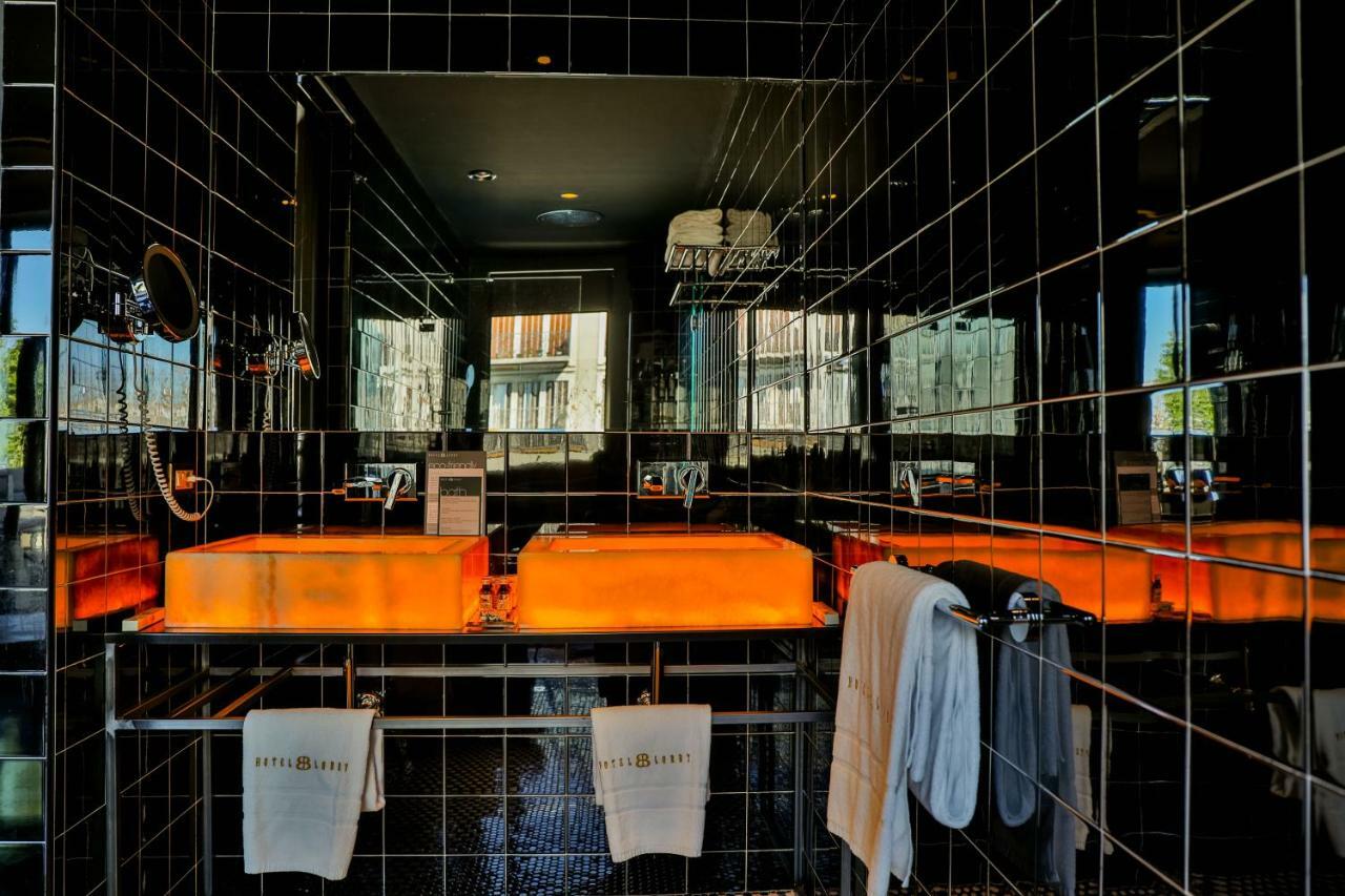 Hotel Lobby Sevilla Bagian luar foto Bathroom at Hotel 114